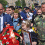 С портретами бойцов - в сквер Славы - Орская хроника